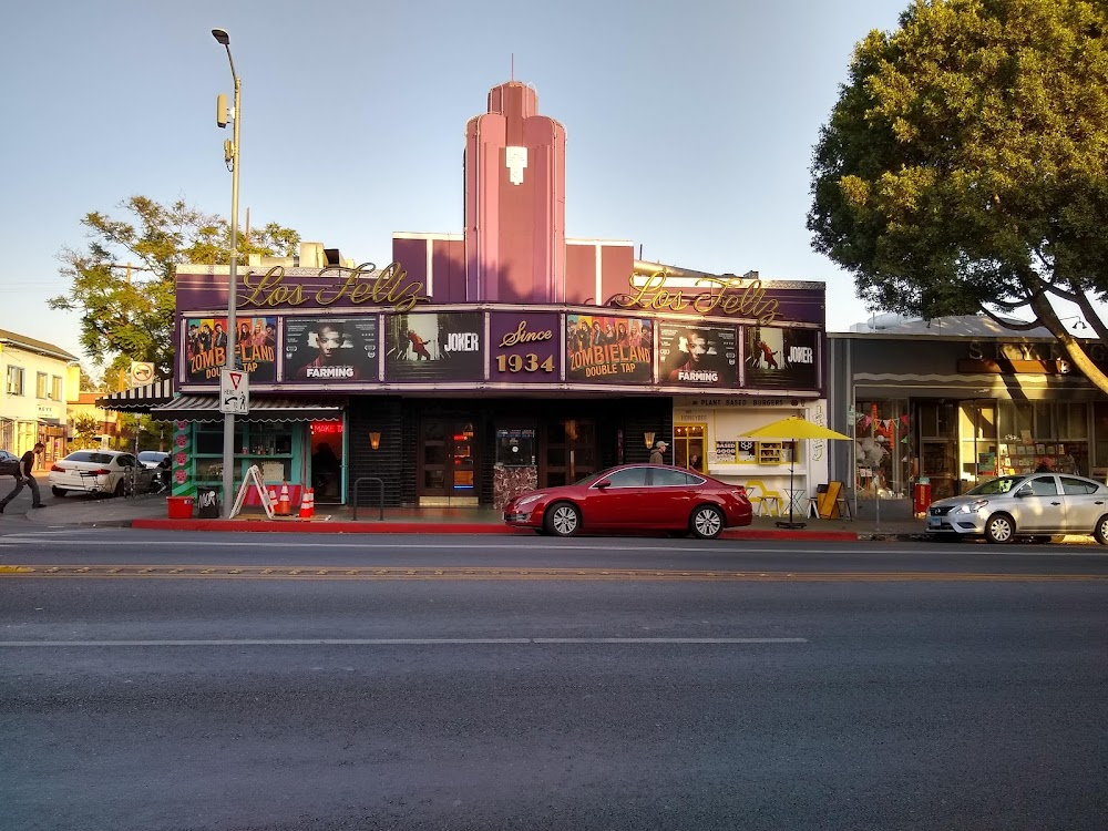 Red Nights : Randy uses payphone across the street from theatre.