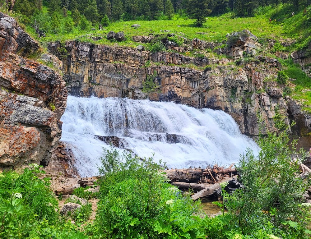 A River Runs Through It : row boating into waterfall