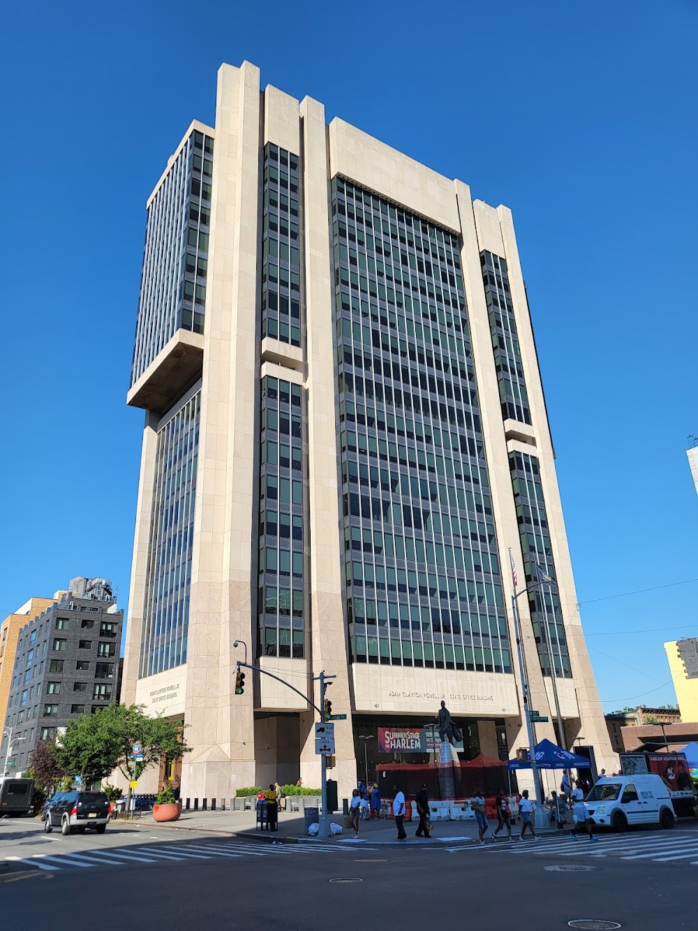 Across 110th Street : Adam Clayton Powell, Jr. State Office Building - Joe Logart runs into building under construction