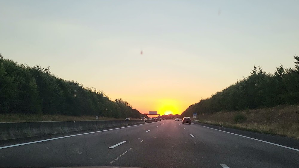 La belle vie : the tourists' coach on the motorway