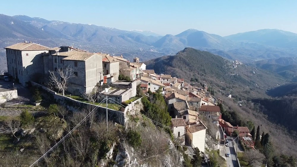 Buona Sera, Mrs. Campbell : hilltop village seen during the opening credits