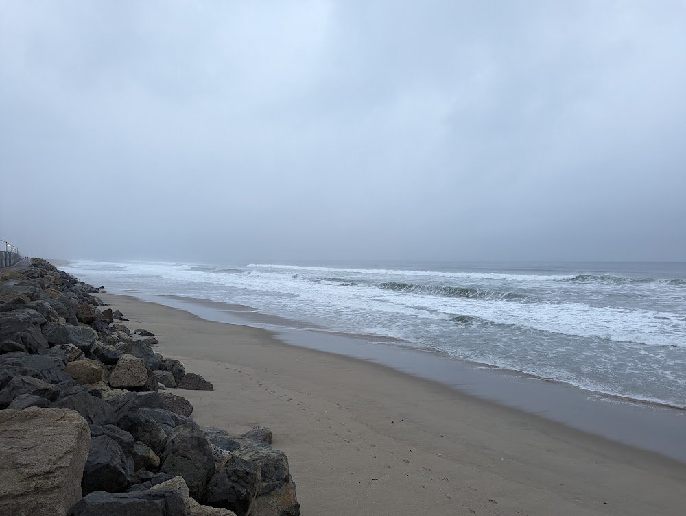 California Girls : Final scene, as seen in background during walk on beach.