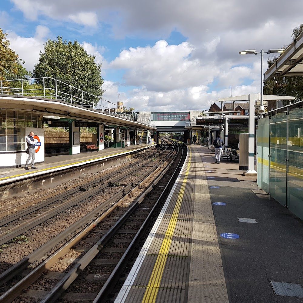 Carry on, Constable : Constable accompanies Passworthy over the station footbridge