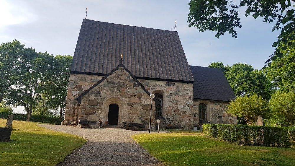 Den vita katten : Church and cemetary