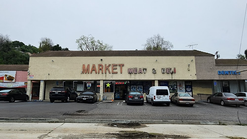 Friday Foster : As 'Washington, DC'. Friday uses payphone at market then takes 'A-Anderson Dairy' delivery truck. Market was demolished in the 2019.