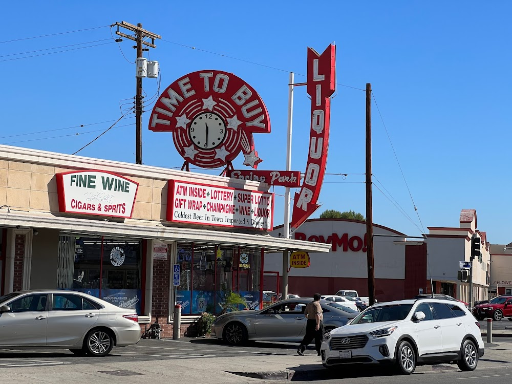 In the Line of Duty: The Price of Vengeance : Taxi cab incident in front of 'Time To Buy' liquor store sign.