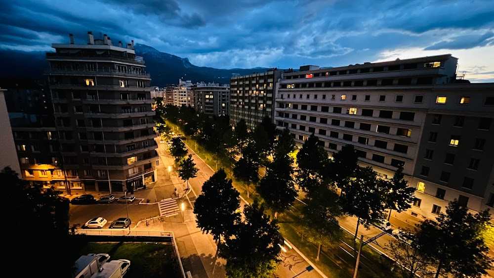 La nuit du 12 : View of the giant mural by Shepard Fairey