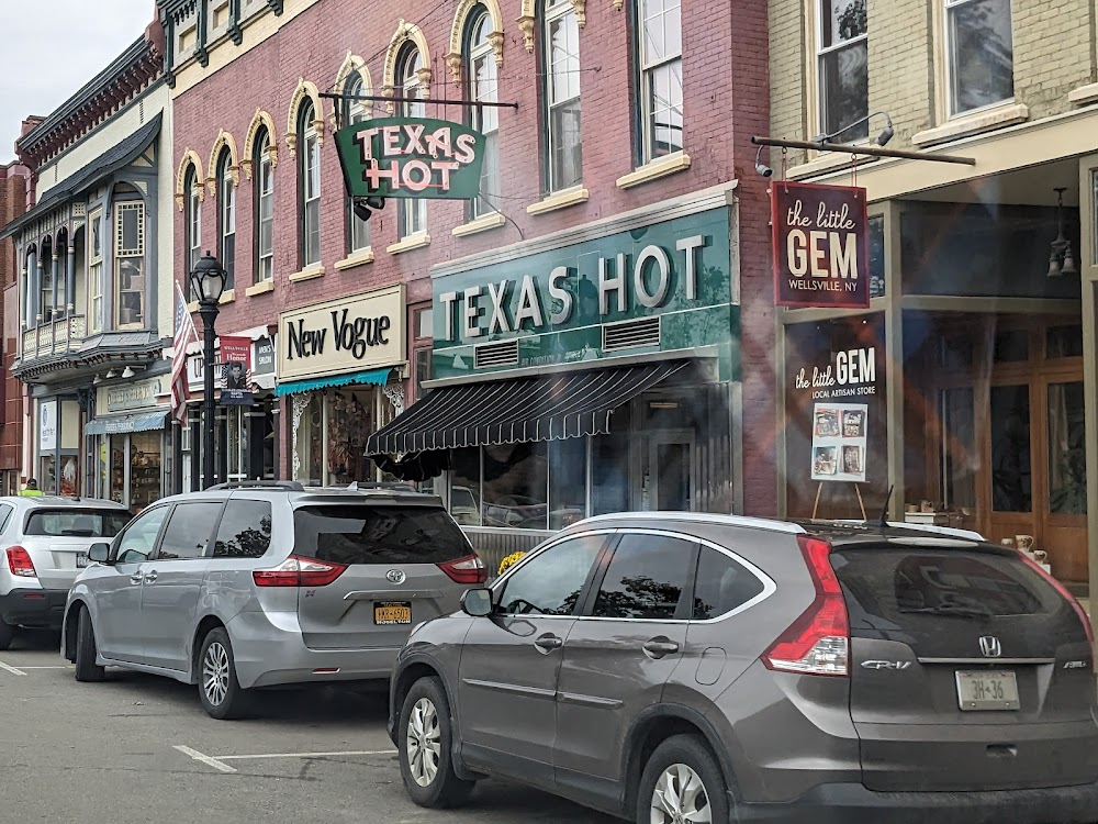 Lady Valor: The Kristin Beck Story : Kristin and her sister have coffee with owner Mike Raptis.