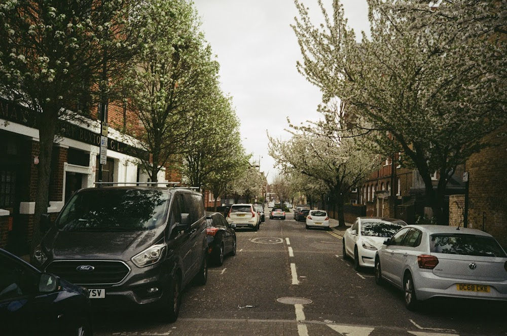 Legend : Street scene with Mercedes car.