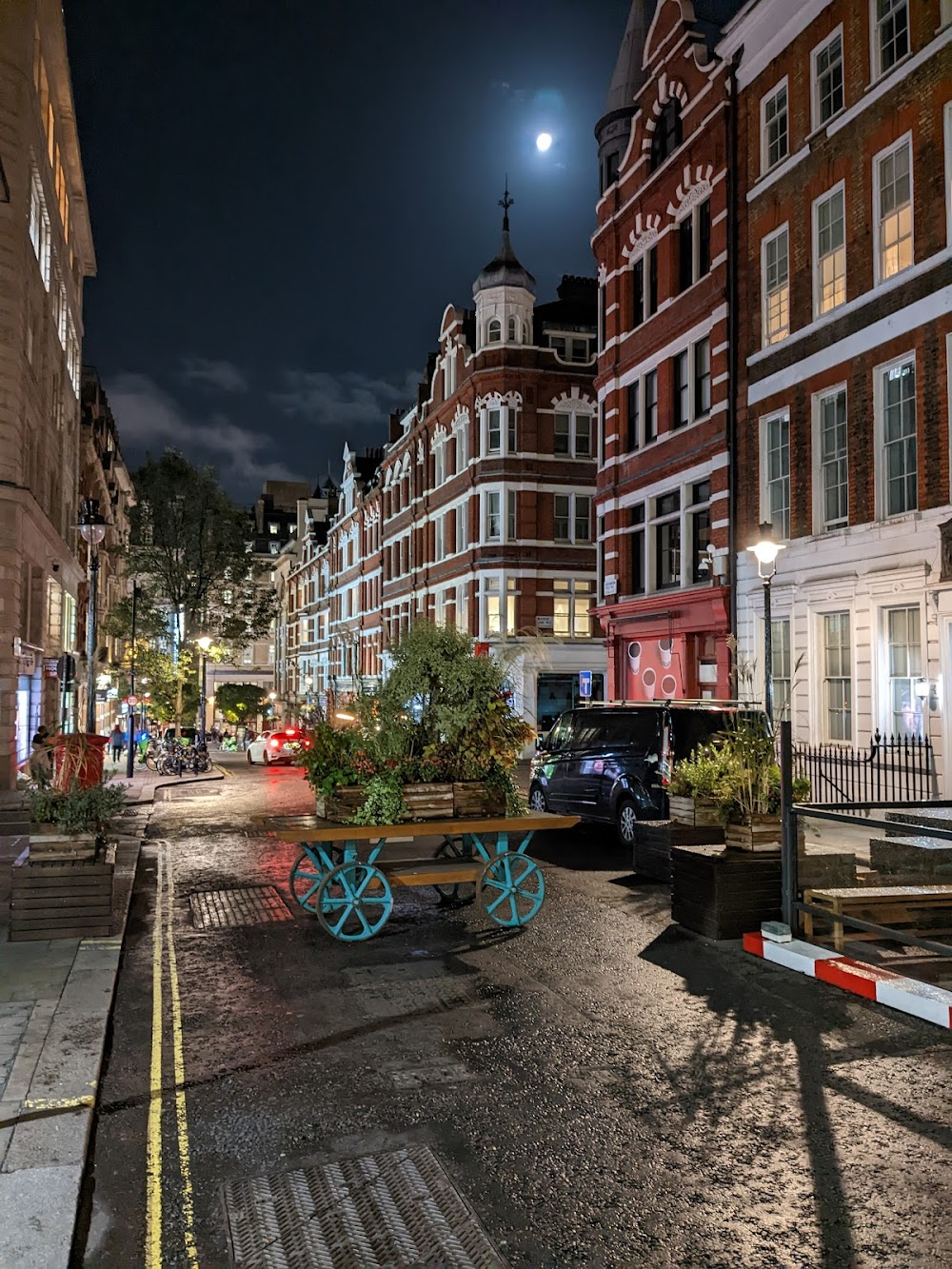 Nowhere to Go : Gregory parks and puts on an orthotic shoe - Covent Garden Market in the background