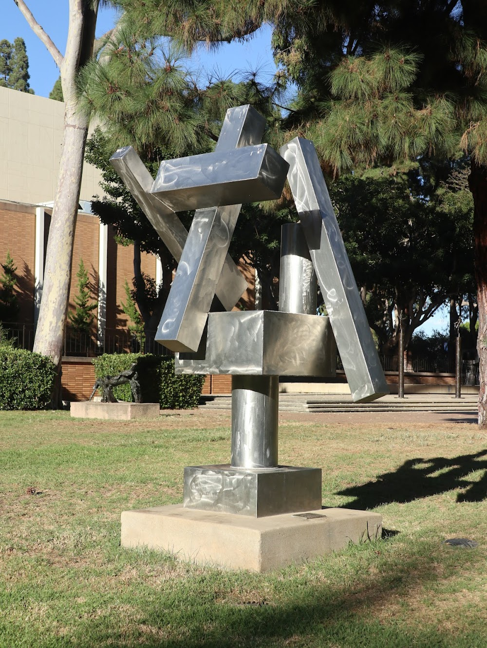 No Place to Hide : Amy Manning walks with Cliff Letterman near the sculptures.