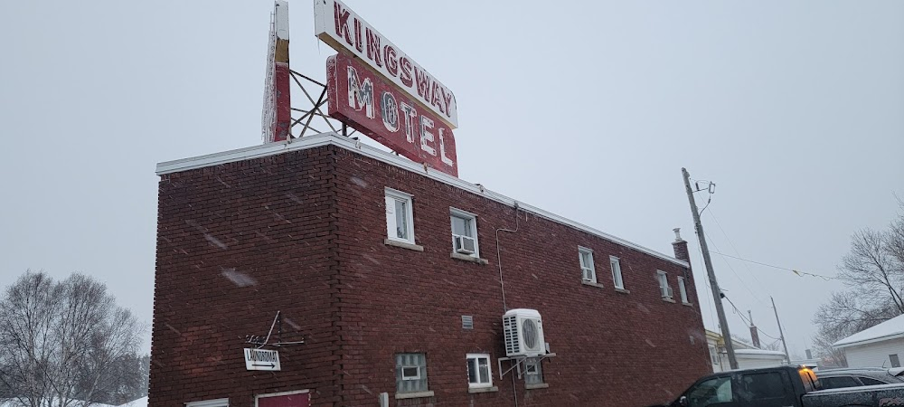 One Week : Scene at the Kingsway Motel, sign seen.