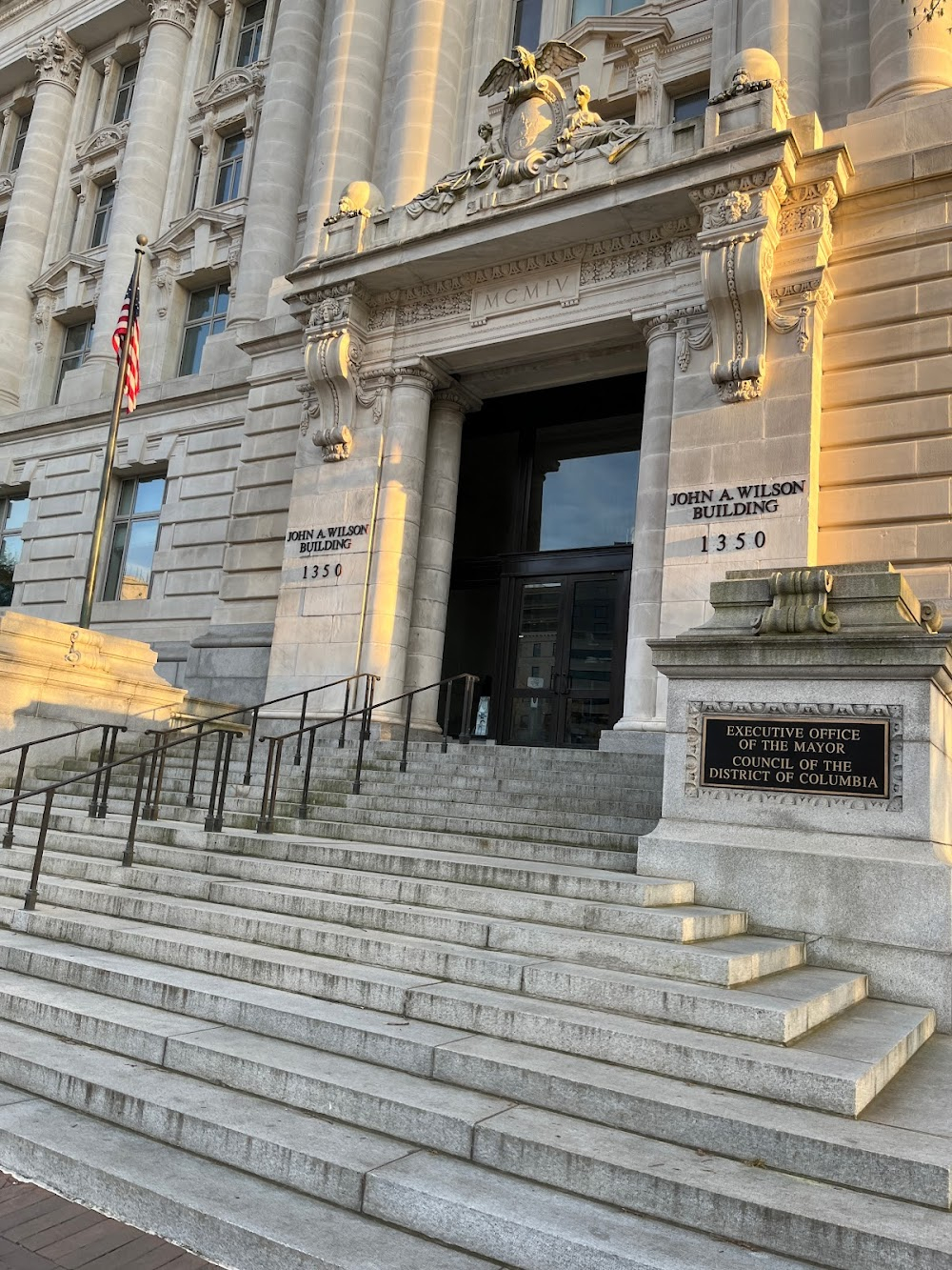 Protocol : known at the time as just the District Building - St. John, Hassler and others exit this building after Sunny turns down the Rolls-Royce, angering the Emir