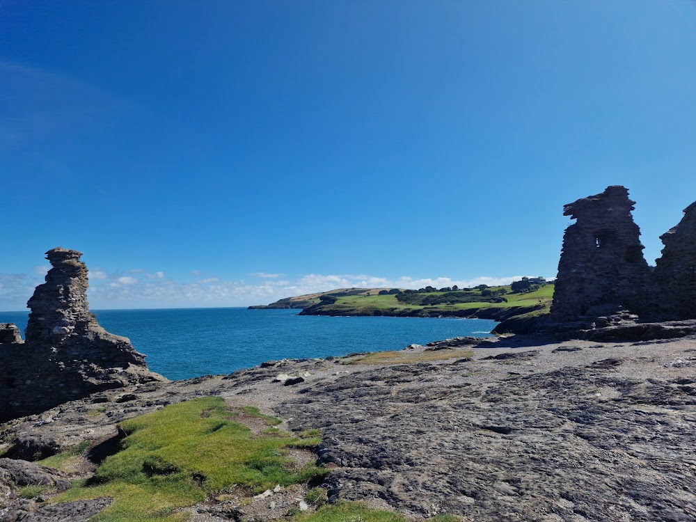 Haunted Harmony Mysteries: Murder in G Major : Gethsemane and Inspector O'Reilly walk along the clifftop away from the castle ruin