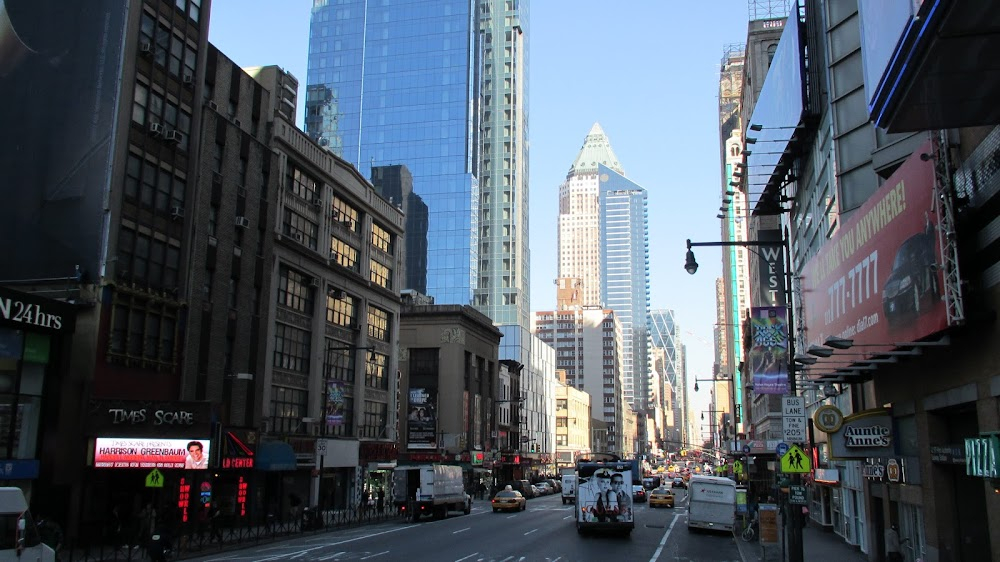 Taxi Driver : Travis walks southwest down 8th to the Show & Tell theater where he buys concessions for the movie