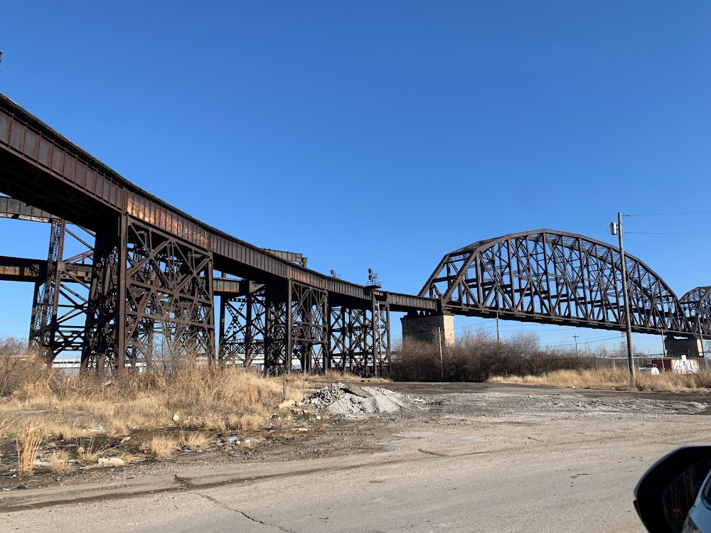 The Hoodlum Priest : bridge in near background as Billy is looking for work along the Mississippi River waterfront