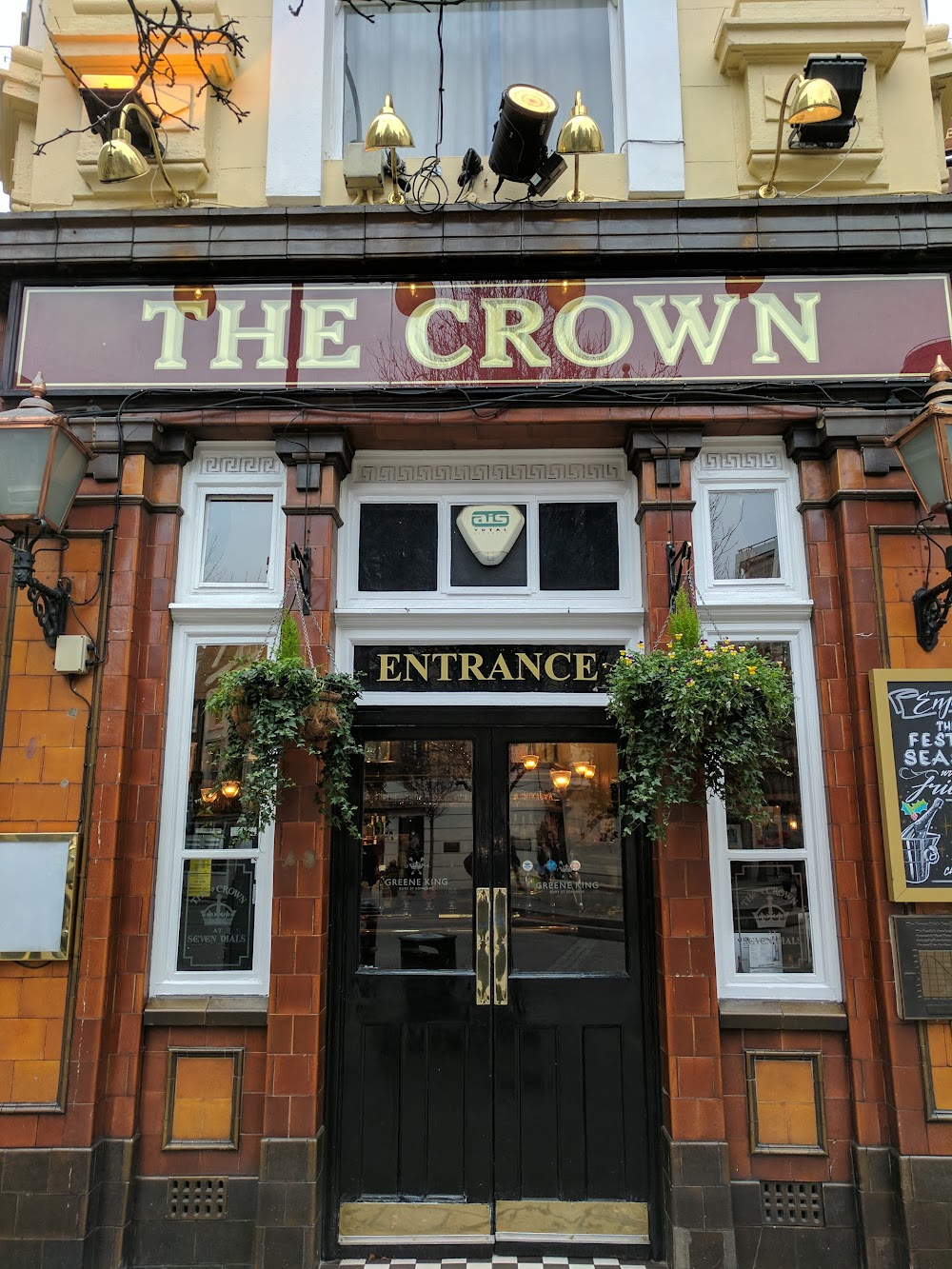 The Naked Truth : police car passes The Crown public house chasing after a false call