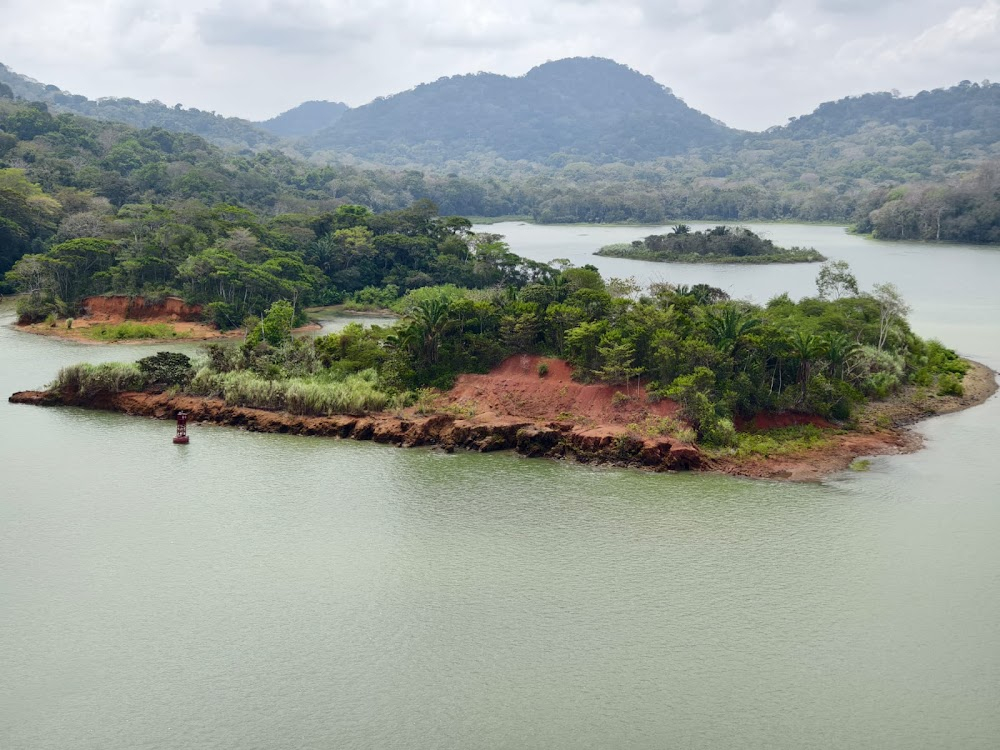 The Tailor of Panama : Andrew Osnard and Louisa Pendel bathe in lake