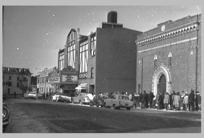 The Toxic Avenger Part II : theater marquee advertising "Troma Film Festival" and later "Apocalypse Now"