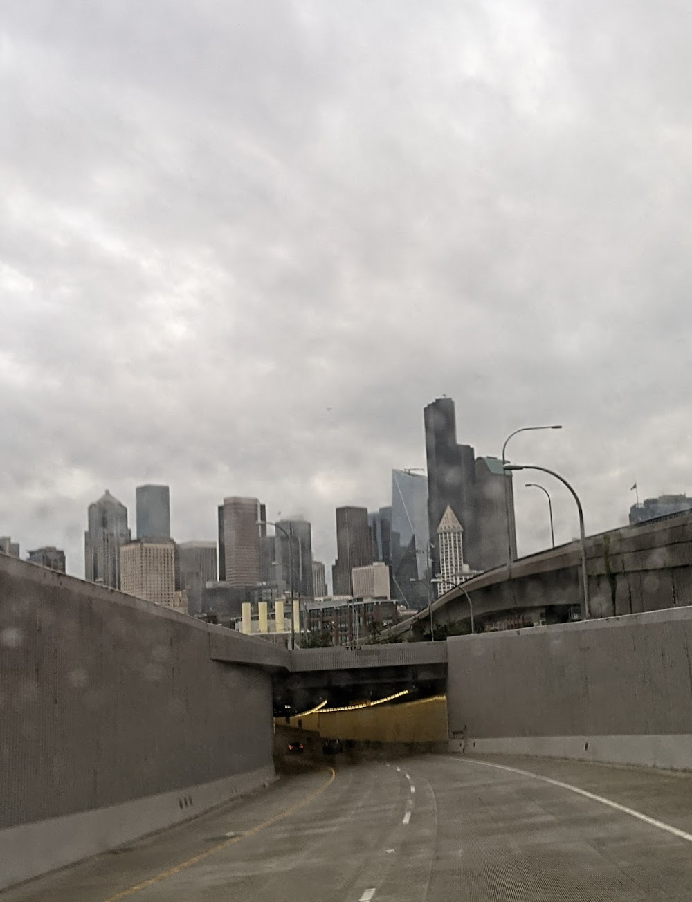 The Unforgivable : Establishing shot - character being driven from prison into Seattle.