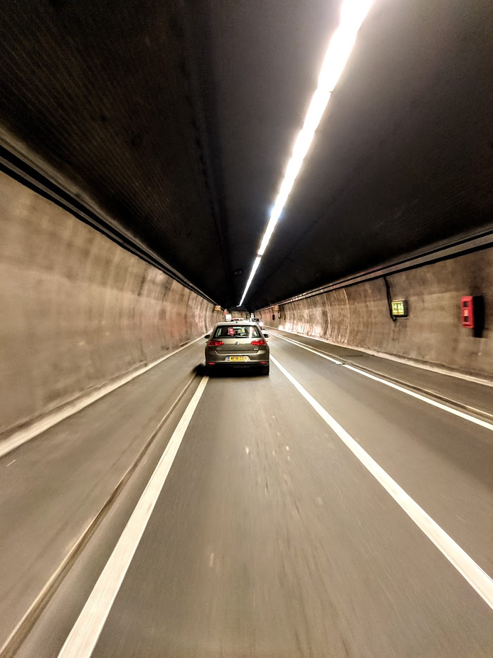 The Silent Playground : Police car carrying Mavis emerges from the Tunnel