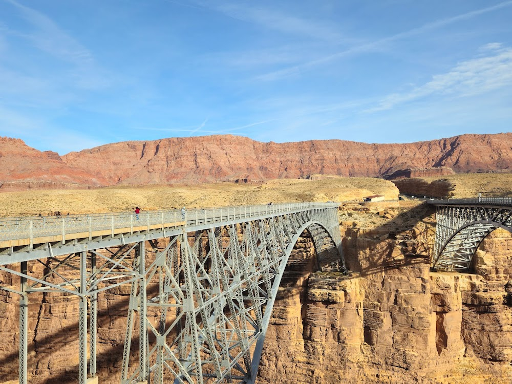 Vacation : Car drives over bridge