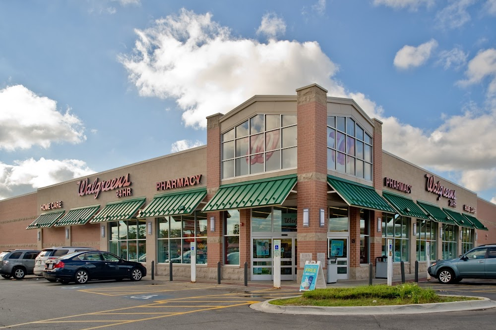 Wayne's World : Driving past the Stack of Cars on a Pole; now a Walgreens